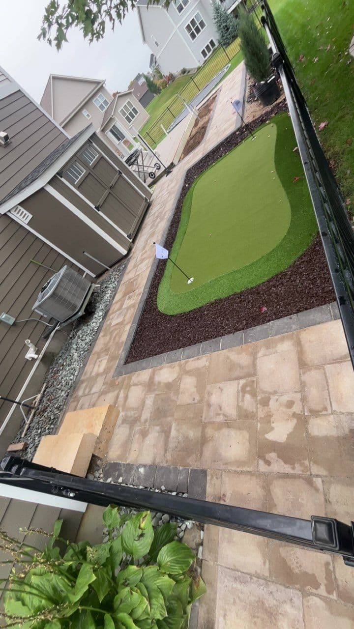 Gallery photos for Backyard Oasis with Patio and Putting Green Installation: Image #2