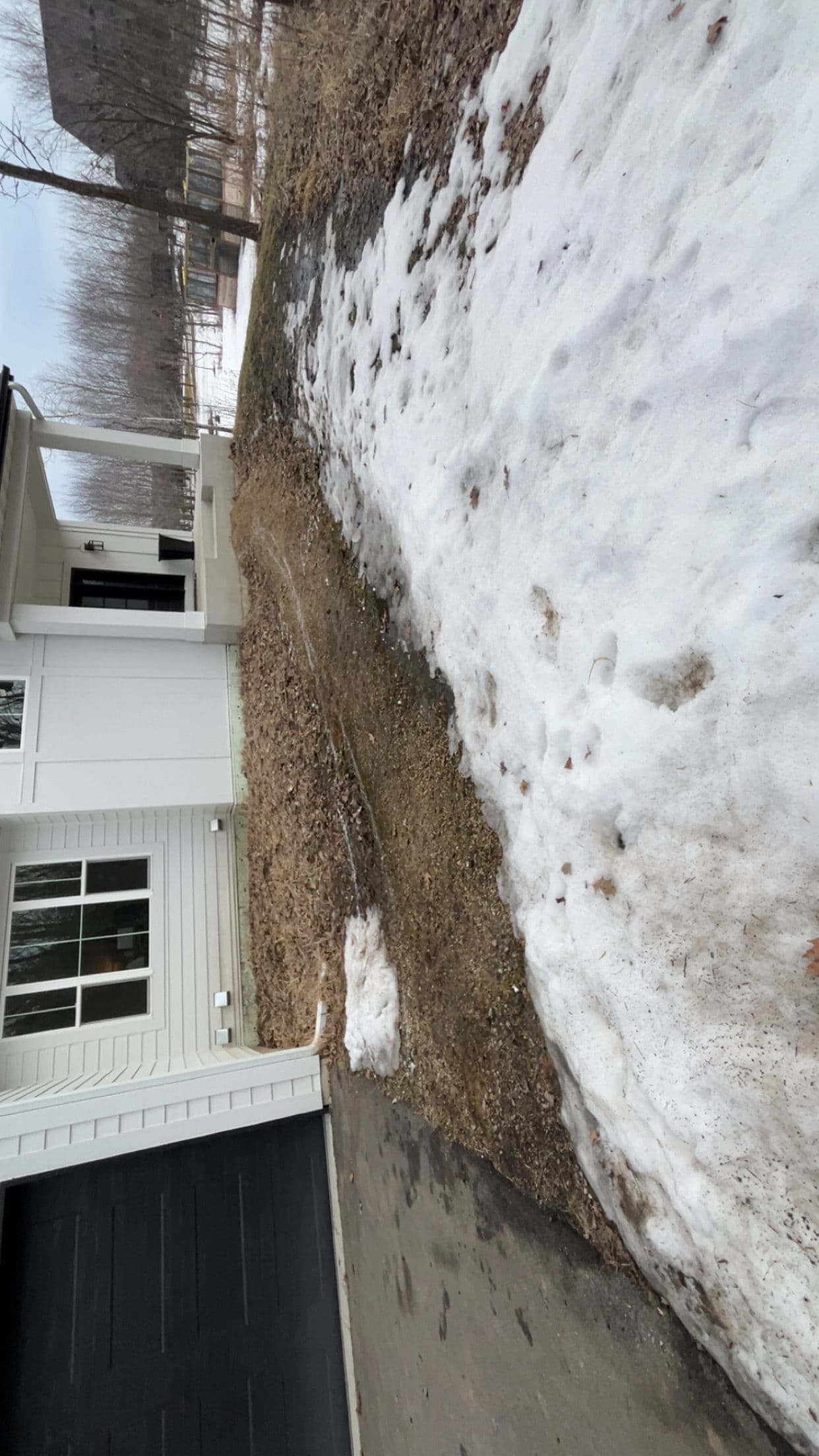 Muddy Slope to Stamped Concrete Patio with Fireplace in Prior Lake image