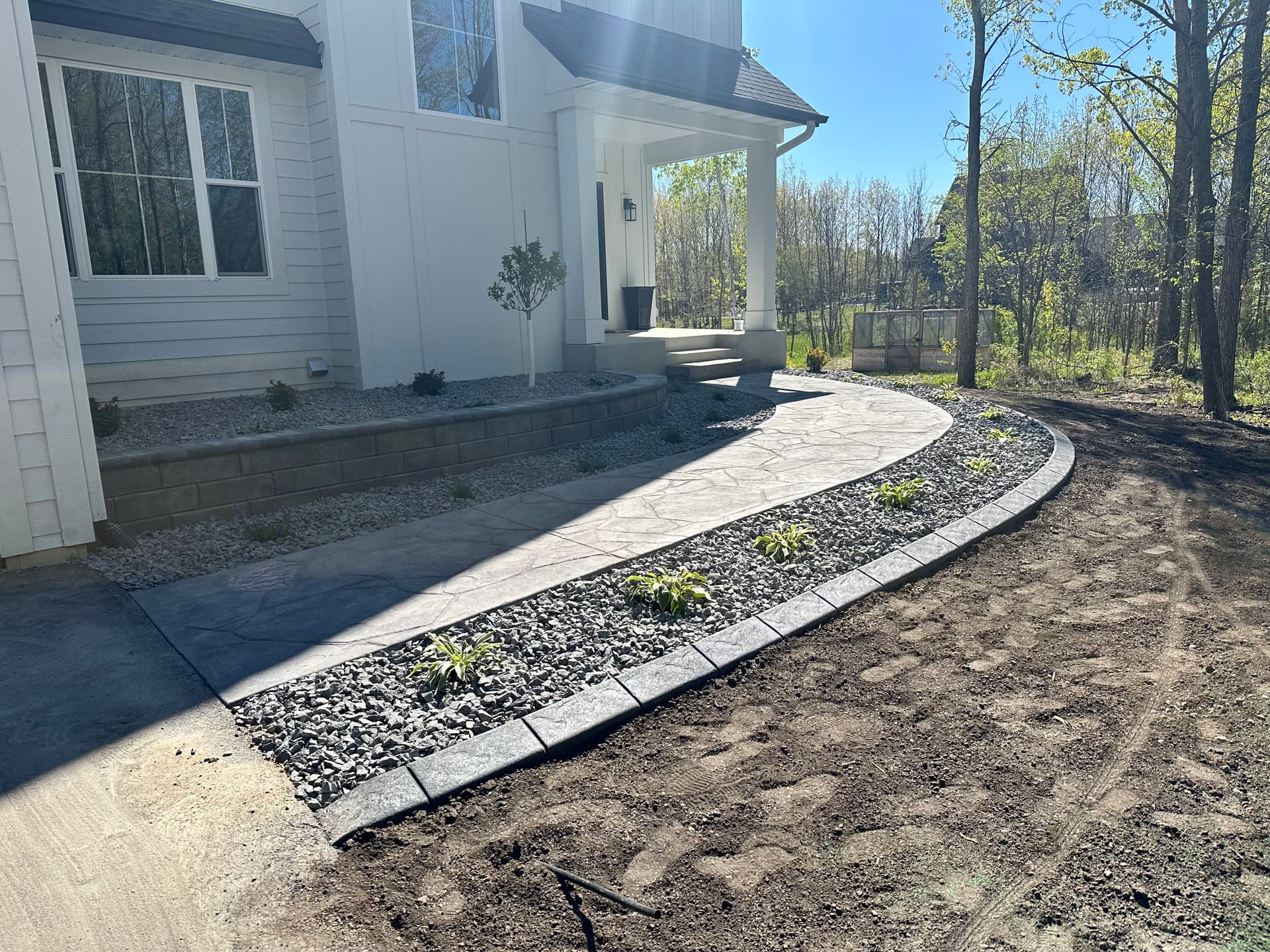 Gallery photos for Muddy Slope to Stamped Concrete Patio with Fireplace in Prior Lake: Image #2